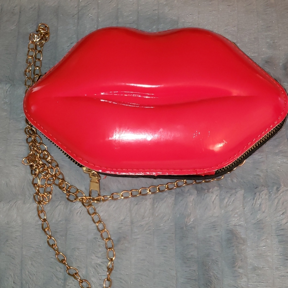 Red lips purse